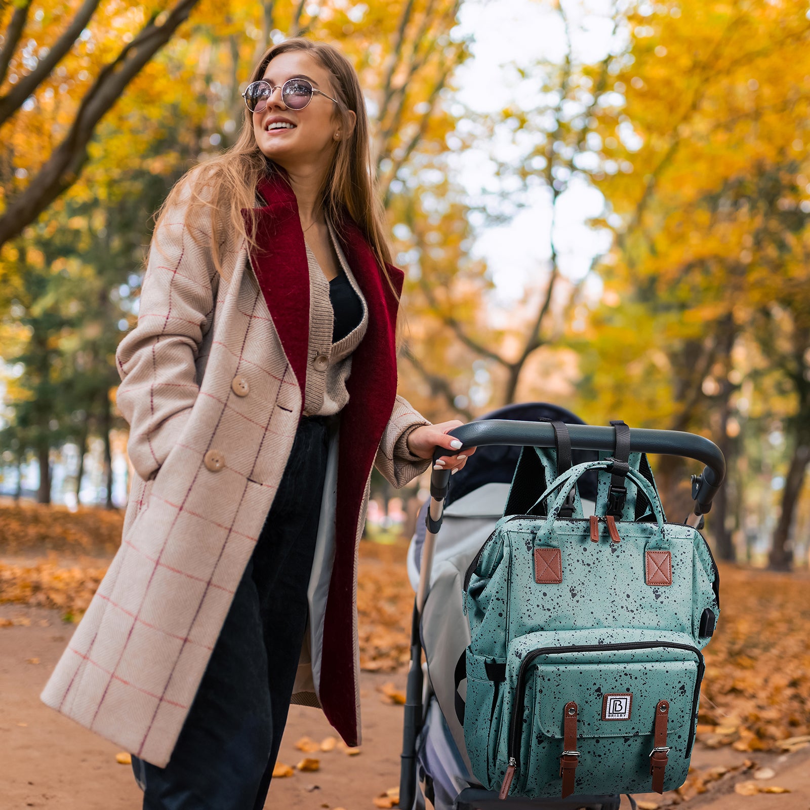 Stayopen changing bag green dots - changing bag - stay-open frame - USB charging function - incl. buggy mounting and changing mat