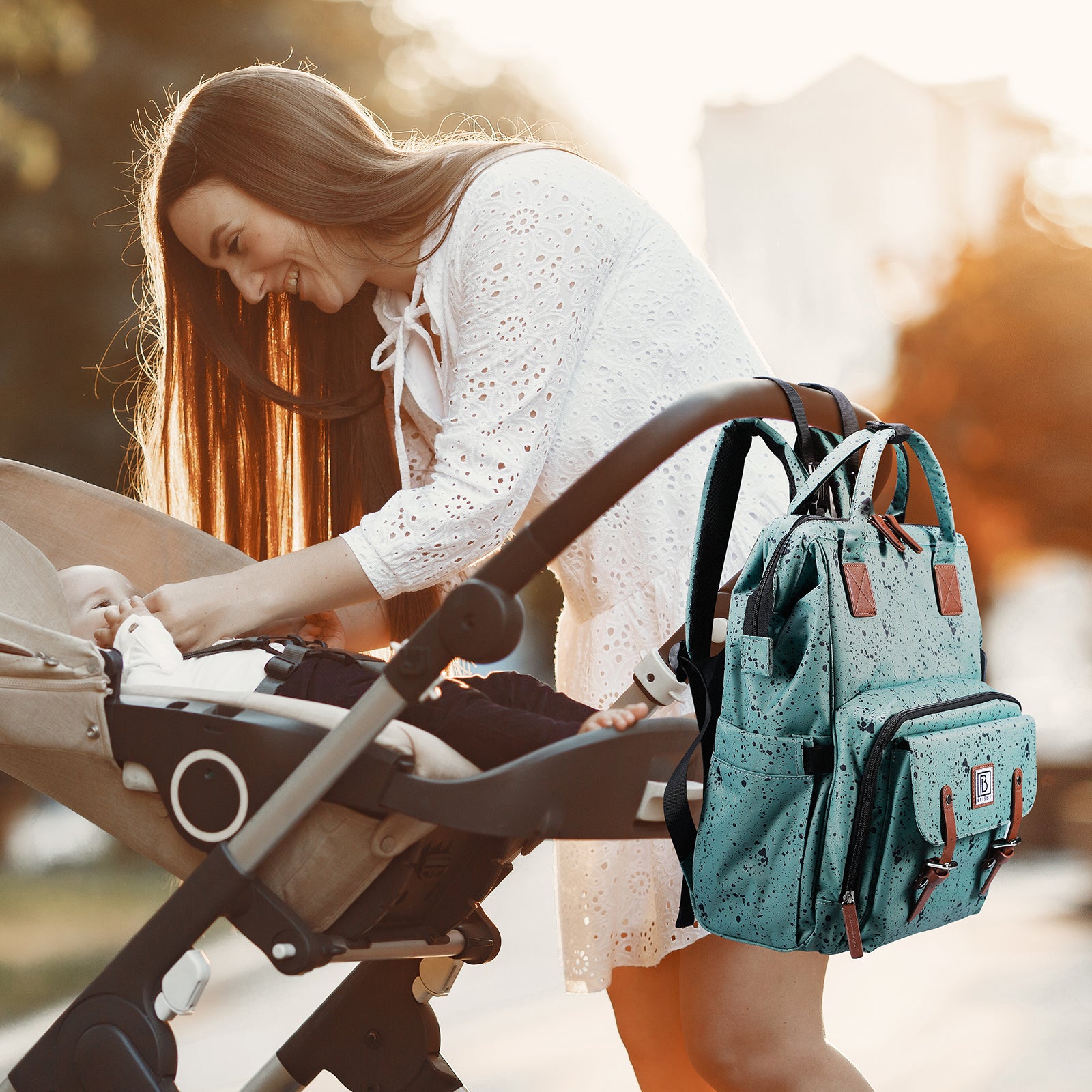 Stayopen changing bag green dots - changing bag - stay-open frame - USB charging function - incl. buggy mounting and changing mat