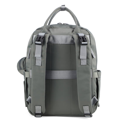 Brisby Premium Luiertas – Uitgebreide en Functionele Verzorgingstas – met buggymontage – Anti Diefstal Vakken - Reistrolley Sleeve - Inclusief verschoonmatje t.w.v.15,99 euro en speenhouder - Levenslange Garantie - Misty Green