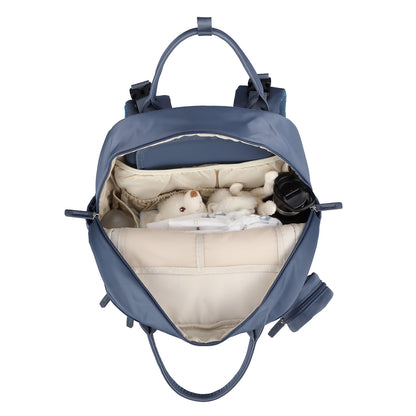 Brisby Premium Luiertas – Uitgebreide en Functionele Verzorgingstas – met buggymontage – Anti Diefstal Vakken - Reistrolley Sleeve - Inclusief verschoonmatje t.w.v.15,99 euro en speenhouder - Levenslange Garantie - Nordic Blue